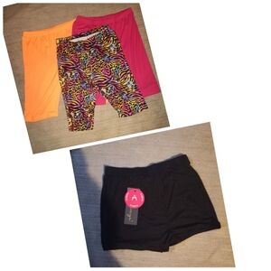 4 pair workout shorts. One NWT 3 washed never worn. Size Large see description .